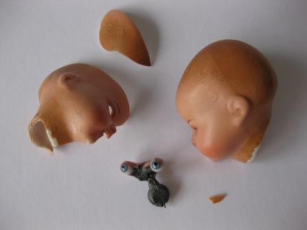 Dolls head and eye mechanism before restoration