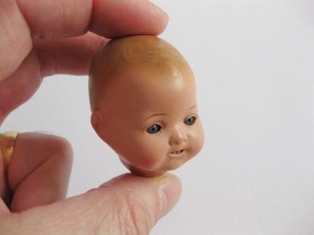 Dolls head after restoration